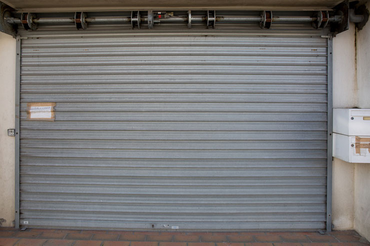 Shop entrance gate repair Bronx NY